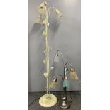 A paint finish metal flower standard lamp, H. 163cm. Together with a floral design table lamp, H.