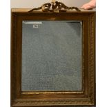 A gilt framed bevelled edged Victorian mirror, frame size 65 x 84cm.