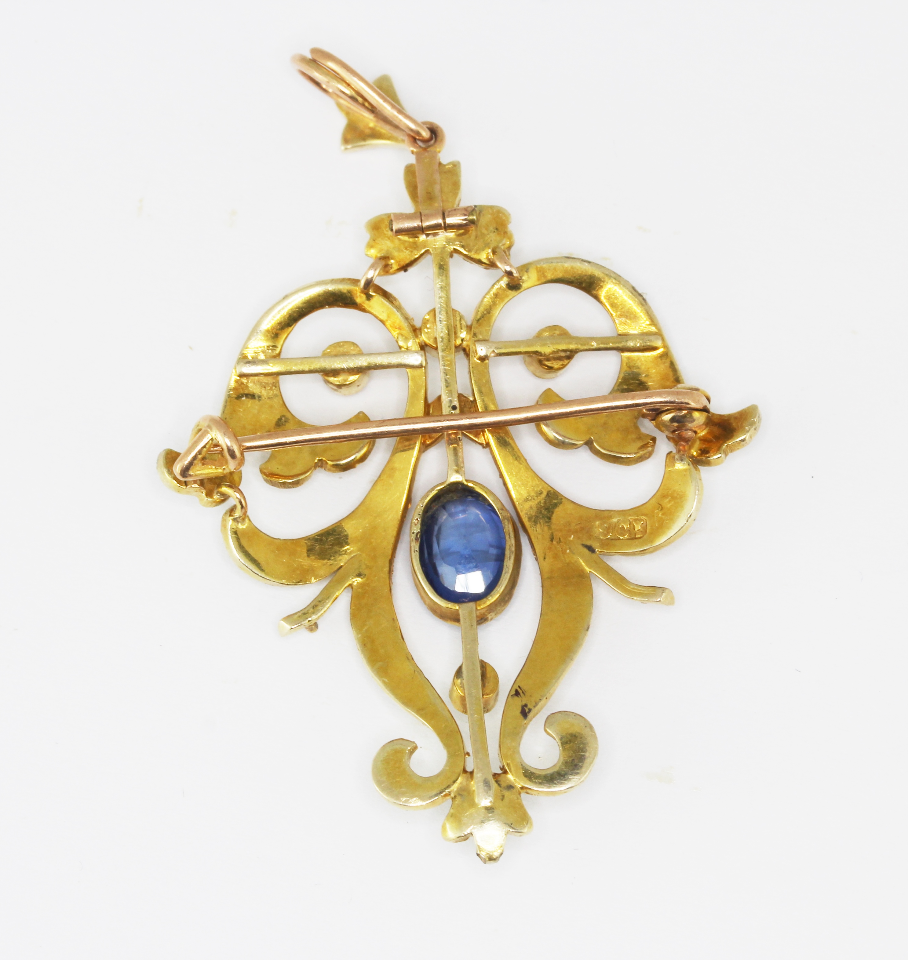 An Edwardian 9ct yellow gold (stamped 9ct) brooch / pendant set with an oval cut sapphire and - Bild 3 aus 3