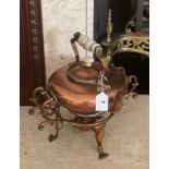 A Victorian copper spirit kettle on stand, H. 34cm.