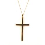 A 9ct gold cross pendent with a fine 9ct gold chain, L. 44cm.