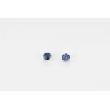 A pair of 9ct white gold (stamped 9K) stud earrings set with brilliant cut sapphires, approx. L.