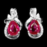 A pair of 925 silver ruby and white stone set earrings, L. 2cm.