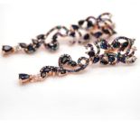 A pair of 925 silver rose gold gilt drop earrings set with pear cut sapphires and other semi