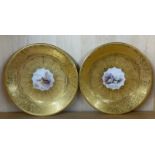 A pair of fine Royal Worcester hand painted and gilt cabinet plates, signed by John Stinton (