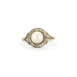 An antique 9ct gold and platinum ring set with a natural pearl and diamonds, (P).