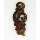 A Chinese carved archaic form jade dragon amulet, L. 9.5cm.