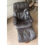 An Ekornes leather upholstered stressless armchair and foot stool.