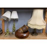 Three useful table lamps and a set of turned wooden salad bowls.