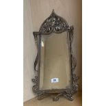 An original Art Nouveau silvered bronze/ brass mirror with original bevelled glass, H. 49cm.