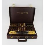 A cased Solingen gold plated cutlery set.