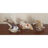 Three Royal Crown Derby porcelain paper weights, dolphin L. 17cm.