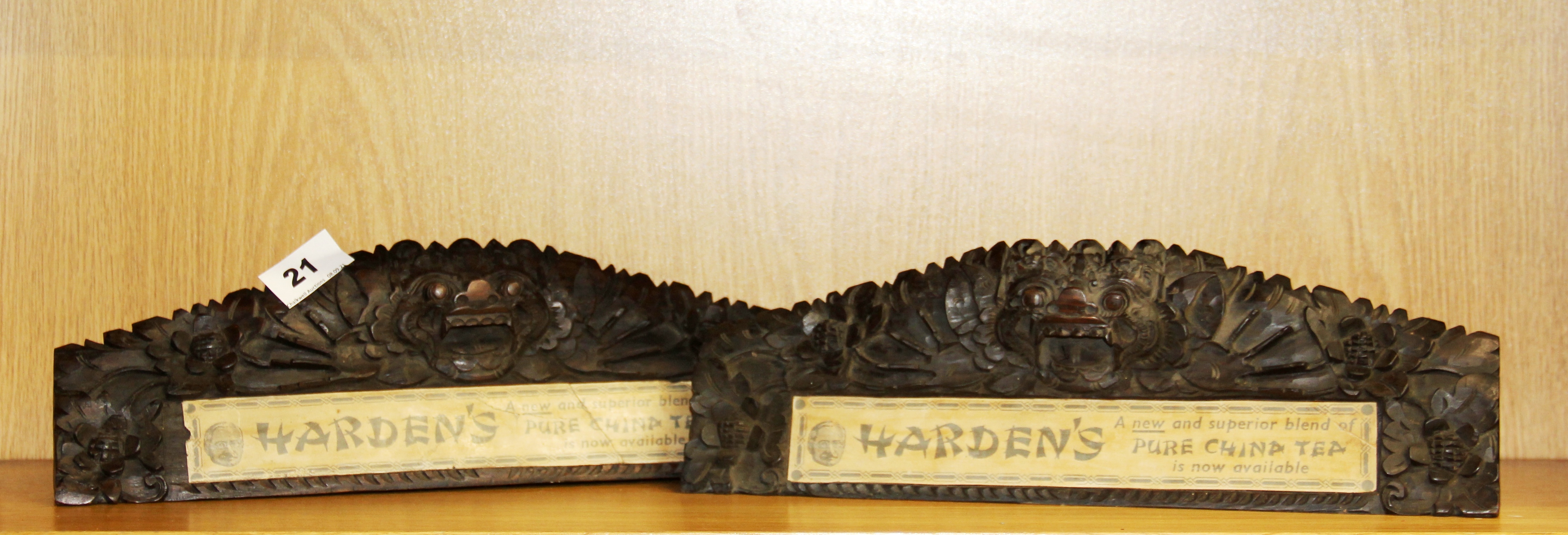 A pair of antique Oriental carved hardwood shop advertising signs for Harding's pure China tea, W.