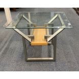 A stylish glass top steel and wood side table with bevelled glass top, 71 x 58 x 58cm