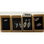Four pairs of mixed silver stone set earrings.