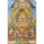 A Tibetan woven Buddhist thangka of the seated Buddha incorporating gold thread, 89 x 60cm.