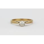 A 9ct yellow gold diamond set solitaire ring, (O.5).