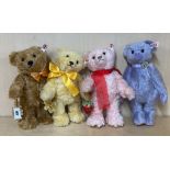 A group of four limited edition Swarovski bears, H. 26cm. With certificates but without boxes.