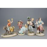 A group of four Capo Di Monte figures, tallest 24cm. Minor finger damage to girl with umbrella and