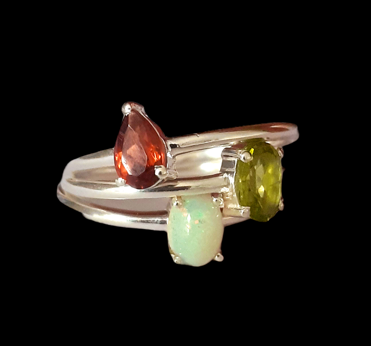 Three 925 silver stacking rings, set with peridot, garnet and opal, (M). - Image 2 of 2