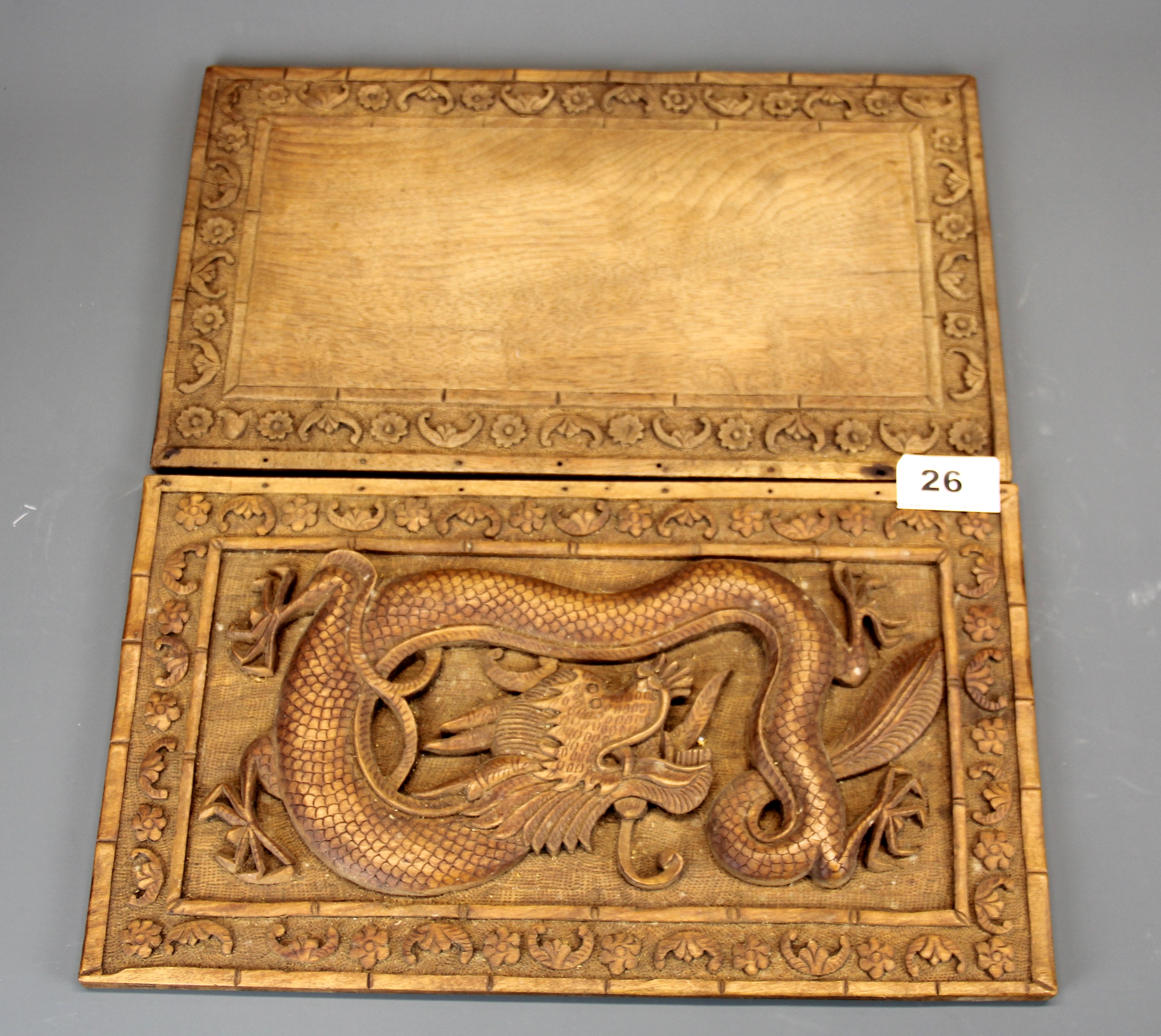 A 19th C Chinese carved wooden book cover, 33 x 19cm.