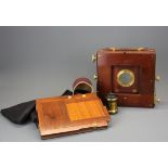 A Middlemiss of Bradford mahogany half plate camera with brass lens, in excellent condition with