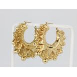 A large pair of hallmarked 9ct yellow gold creole hoop earrings, L. 4.5cm.