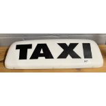 A magnetic roof top taxi sign, W. 61cm.