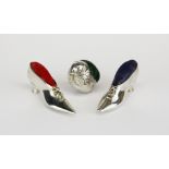 Two hallmarked silver shoe pin cushions, L. 5.5cm. together with a white metal chick pin cushion.