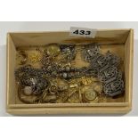 A box of mixed vintage jewellery items.