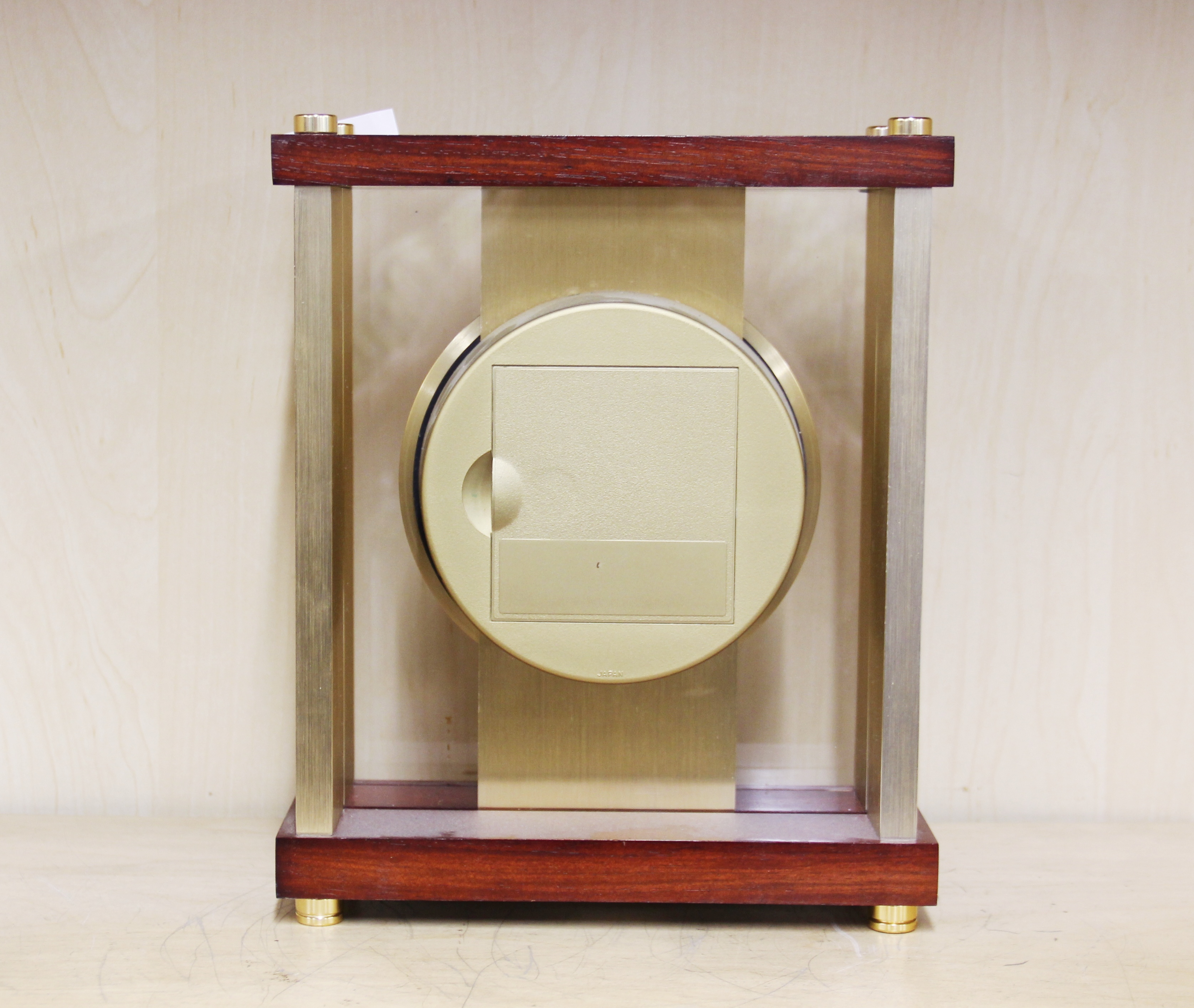 A 1970's Seiko gilt brass and teak mantle clock, H. 25cm. Currently in working order. - Image 2 of 3