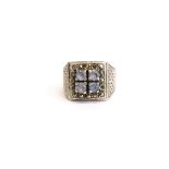 A heavy 925 silver blue topaz and marcasite ring (R), table size 1.5 x 1.5cm.
