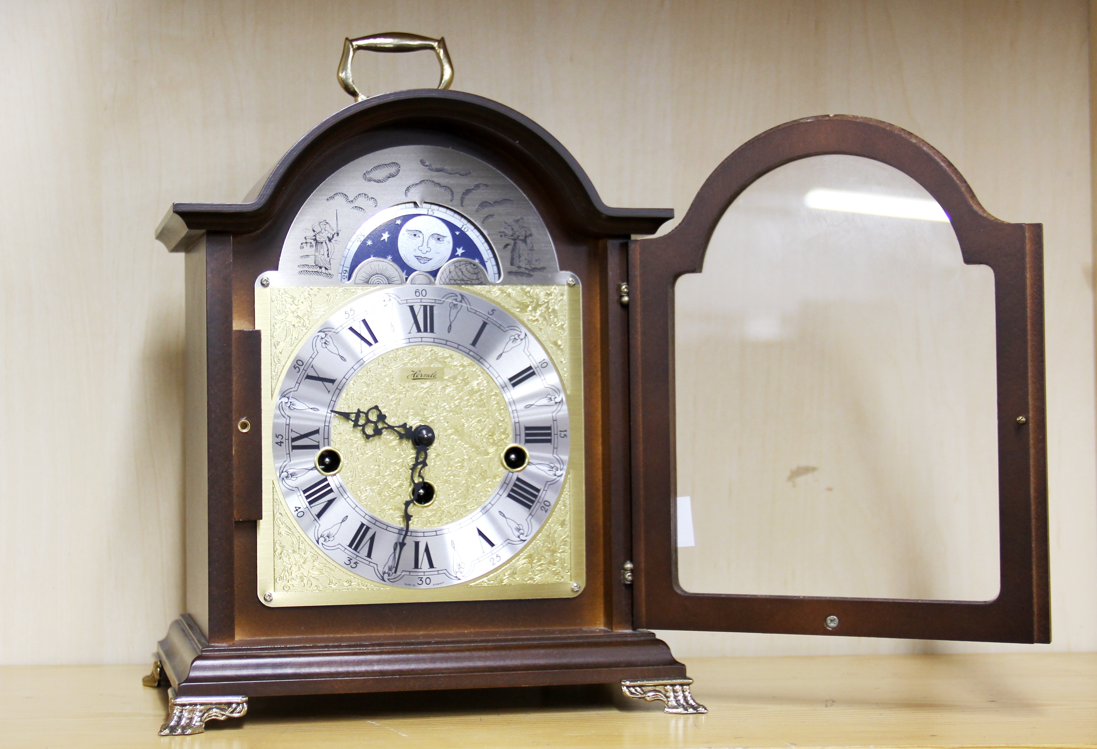 A Hermle moonphase chiming bracket clock, H. 29cm.