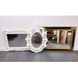 A gilt framed mirror, 94 x 70cm. together with two ornate contemporary mirrors.
