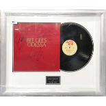 A signed and framed Bee Gees record 'Odessa' with certificate of authenticity on back, frame 70 x