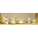 A fine Tuscan china part tea set (one saucer missing) together with a Royal Doulton 'Cranbourne'