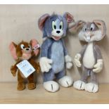 A group of three Steiff limited edition figures of Tom and Jerry and Bugs Bunny with certificates,