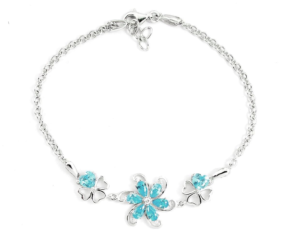 A 925 silver flower shaped bracelet set with pear cut blue topaz, L. 20cm.