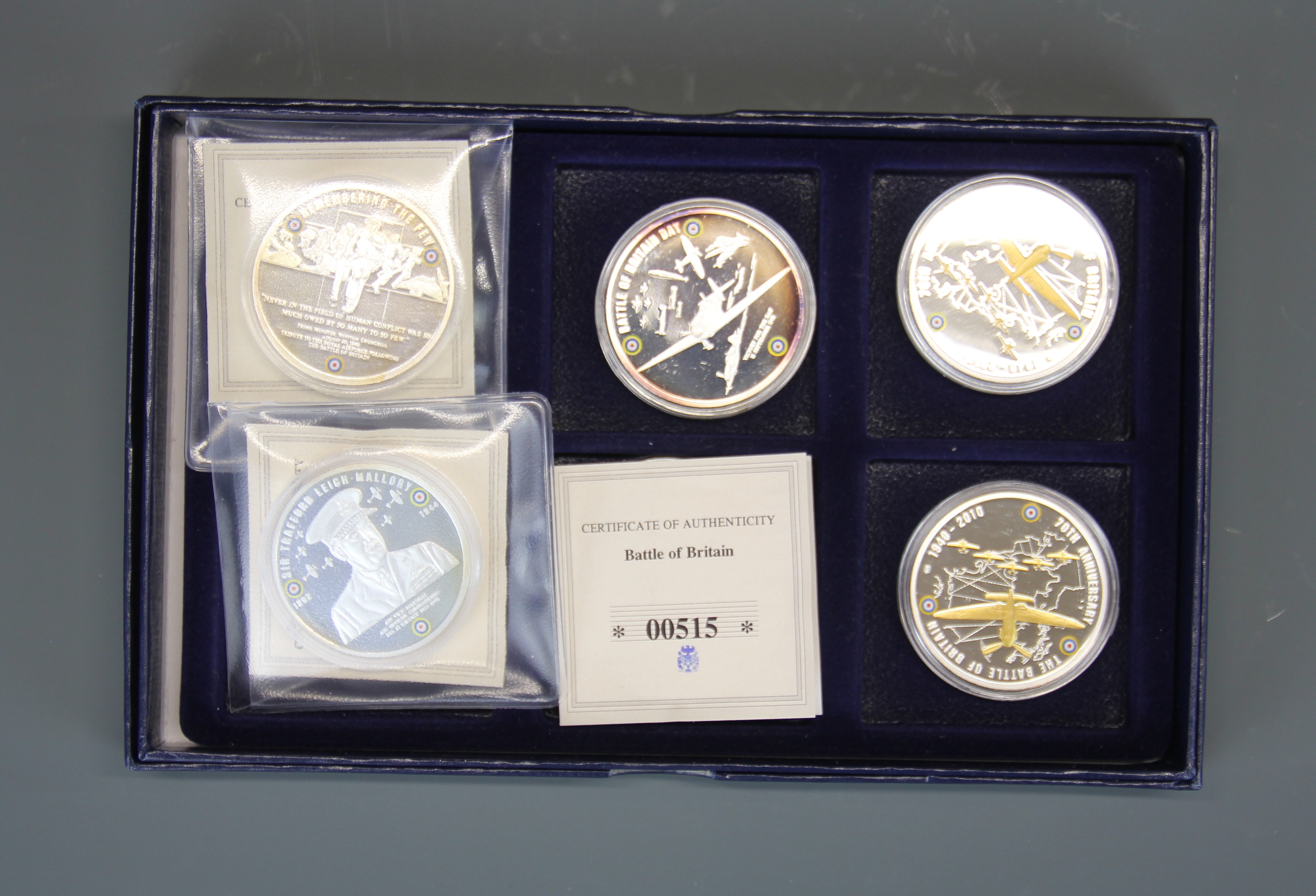 Three boxed Coalport commerative plates and a group of six Battle of Britain commerative coins. - Image 2 of 2