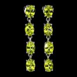 A pair of 925 silver drop earrings set with oval cut peridots, L. 4cm.