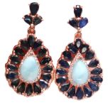 A pair of 925 silver rose gold gilt drop earrings set with cabochon cut larimar and pear cut