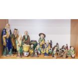 A group of Chinese glazed pottery figures, tallest 24cm.