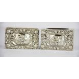 Two hallmarked silver items decorated with cherubs. Snuff box and matchbox cover, size 6.5 x 4cm.