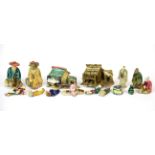 A collection of Chinese porcelain miniature figures with a tableau.