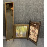 A hammered brass fire screen, a wooden fire screen (H. 81cm) and a gilt framed mirror.