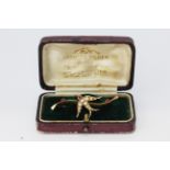 A boxed hallmarked 9ct yellow gold Edwardian brooch set with seed pearls and rhodolite garnets,