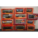 A group of Hornby 00 gauge rolling stock.