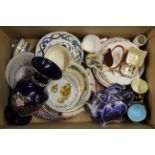 A box of mixed good china.