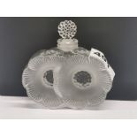 A frosted crystal perfume bottle, signed Lalique France, H. 9.5cm.