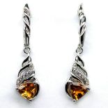 A pair of 925 silver drop earrings set with trillion cut citrines and white stones, L. 3.5cm.